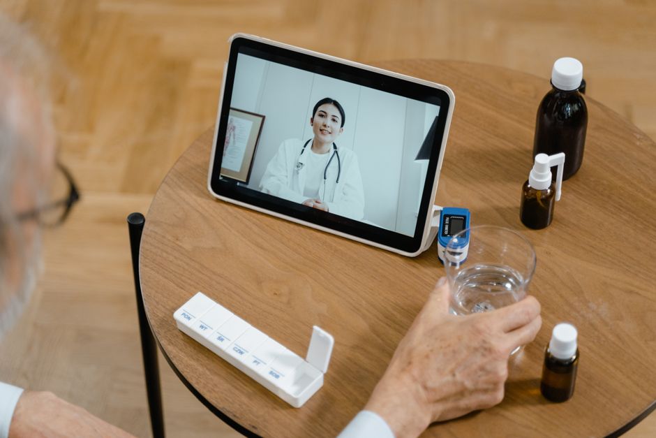 Doctor discussing oxycodone dosage and medical review with a patient