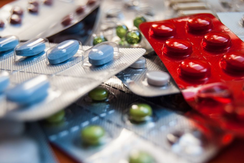 Empty pharmacy shelves illustrating a medication shortage affecting patients