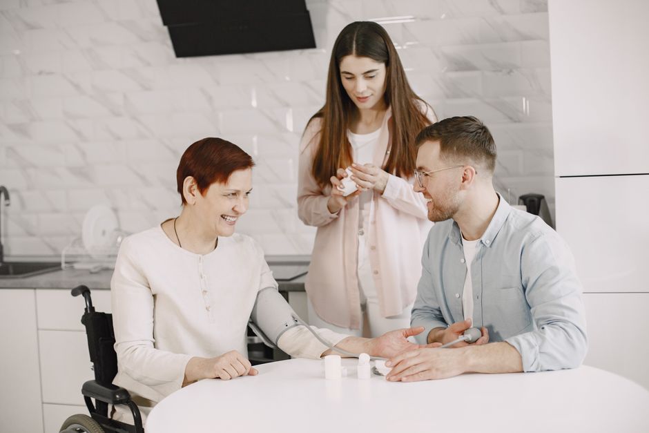 Family member helping a loved one manage oxycodone medication at home