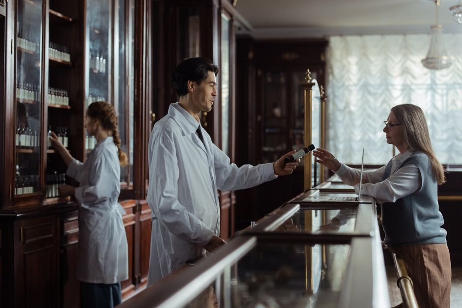 Pharmacist discussing individualized medication dosing with a patient